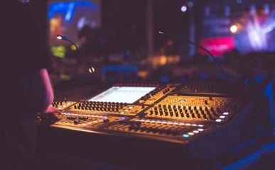 mixing console in a venue